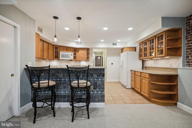 1240 Girard St NW, Washington, DC 20009 - kitchen featuring open shelves, white appliances, brown cabinets, a peninsula, and recessed lighting