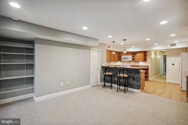 1240 Girard St NW, Washington, DC 20009 - kitchen featuring white appliances, open shelves, a breakfast bar area, recessed lighting, and light colored carpet
