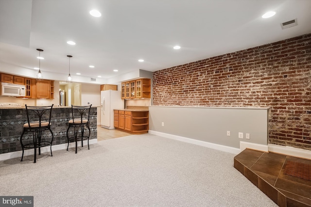 1240 Girard St NW, Washington, DC 20009 - kitchen with white appliances, open shelves, a kitchen breakfast bar, recessed lighting, and light carpet