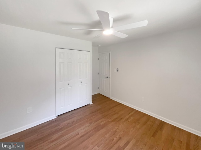 7804 Alberta Ct, Springfield, VA 22152 - unfurnished bedroom with light wood-style flooring, a closet, and a ceiling fan