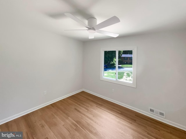 7804 Alberta Ct, Springfield, VA 22152 - empty room with wood finished floors and a ceiling fan