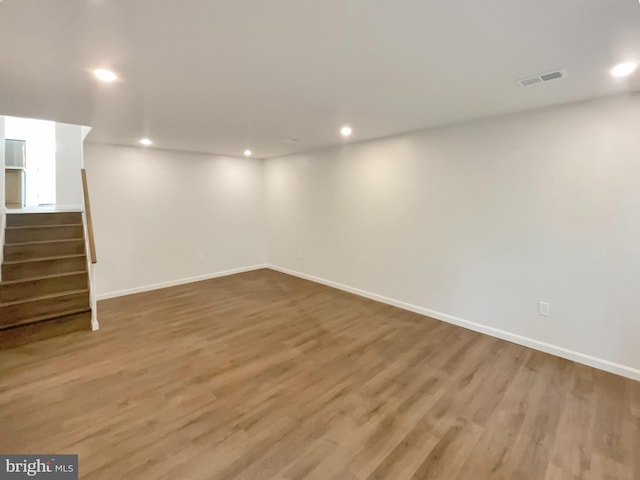 7804 Alberta Ct, Springfield, VA 22152 - finished basement featuring wood finished floors, recessed lighting, and stairs