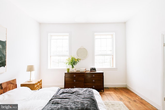 1498 Mckinstrys Mill Rd, Union Bridge, MD 21791 - bedroom with light wood-style flooring and multiple windows