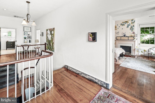 1498 Mckinstrys Mill Rd, Union Bridge, MD 21791 - stairway featuring hardwood / wood-style flooring and a fireplace