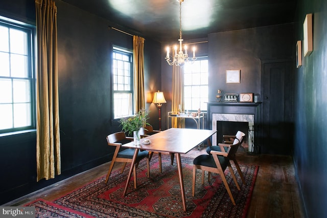 1498 Mckinstrys Mill Rd, Union Bridge, MD 21791 - dining room with hardwood / wood-style floors, a chandelier, plenty of natural light, and a high end fireplace