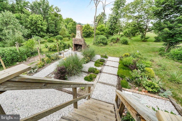 1498 Mckinstrys Mill Rd, Union Bridge, MD 21791 - view of grassy yard featuring an outdoor stone fireplace