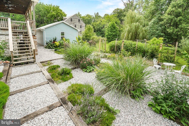 1498 Mckinstrys Mill Rd, Union Bridge, MD 21791 - view of yard with stairs, a wooden deck, and ceiling fan