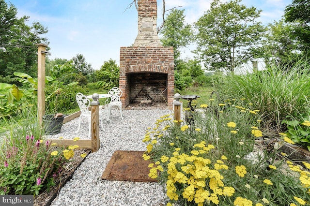 1498 Mckinstrys Mill Rd, Union Bridge, MD 21791 - view of patio featuring an outdoor brick fireplace