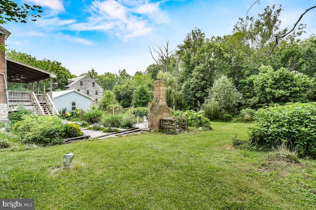 1498 Mckinstrys Mill Rd, Union Bridge, MD 21791 - view of green lawn with stairway and ceiling fan