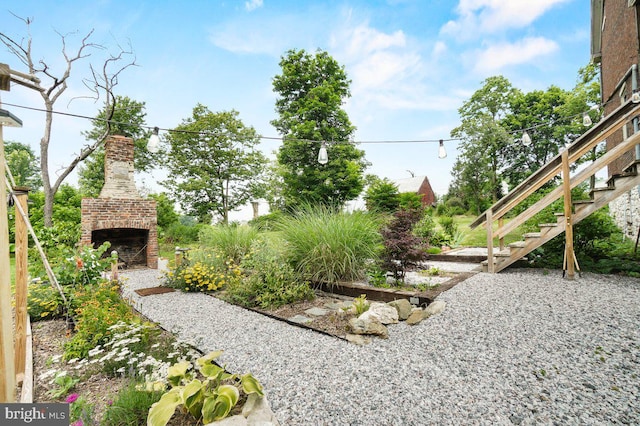 1498 Mckinstrys Mill Rd, Union Bridge, MD 21791 - view of yard featuring an outdoor brick fireplace and stairway