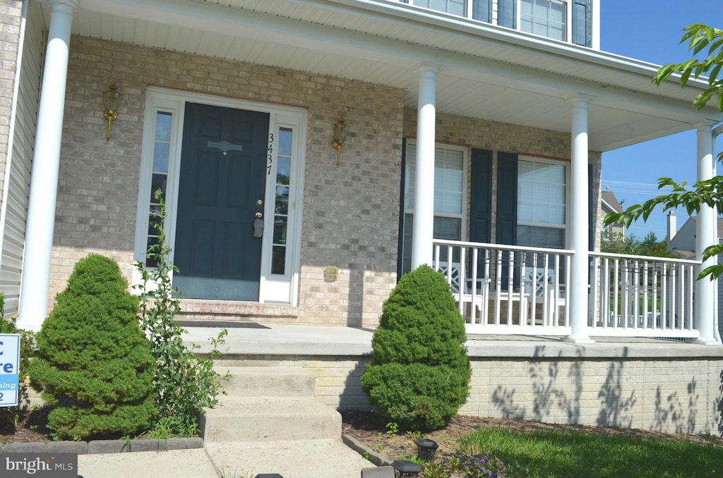 3437 Henry Harford Dr, Abingdon, MD 21009 - view of exterior entry with covered porch and brick siding