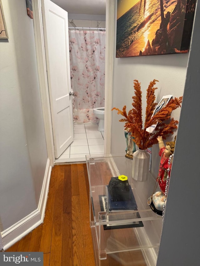 2212 Cove Rd, Pennsauken, NJ 08110 - corridor featuring wood finished floors