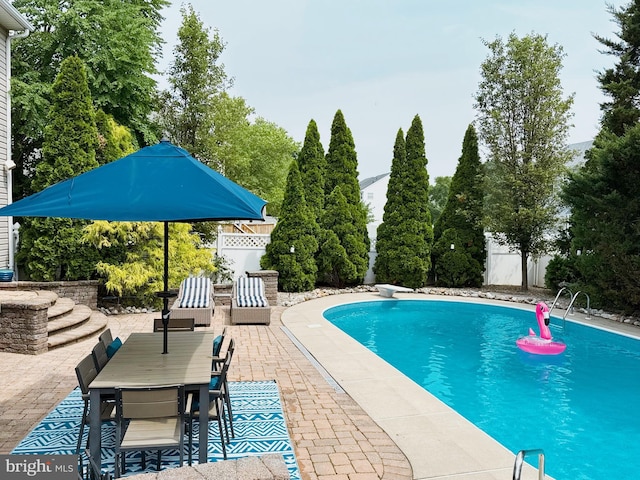 102 Wildflower Ct, Wenonah, NJ 08090 - outdoor pool featuring a patio, a diving board, and outdoor dining area