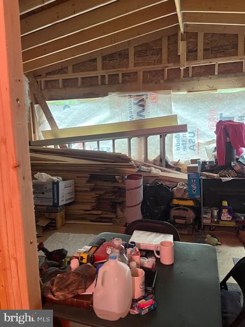 659 Falconwood Rd, Paw Paw, WV 25434 - miscellaneous room featuring lofted ceiling and healthy amount of natural light