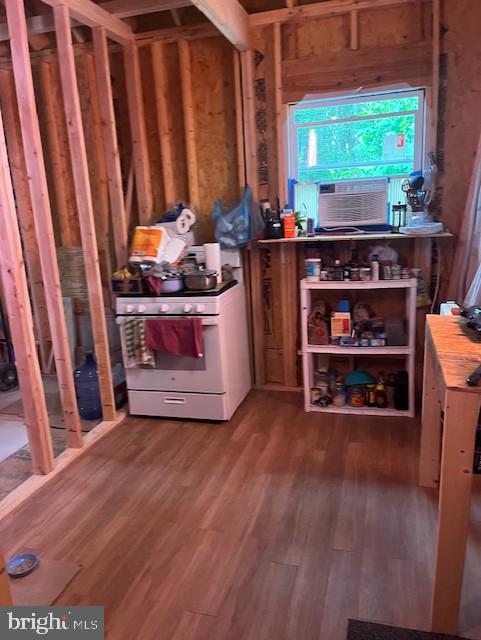 659 Falconwood Rd, Paw Paw, WV 25434 - misc room with wood finished floors and cooling unit
