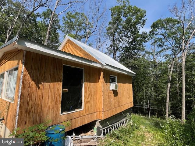 659 Falconwood Rd, Paw Paw, WV 25434 - view of property exterior featuring a metal roof