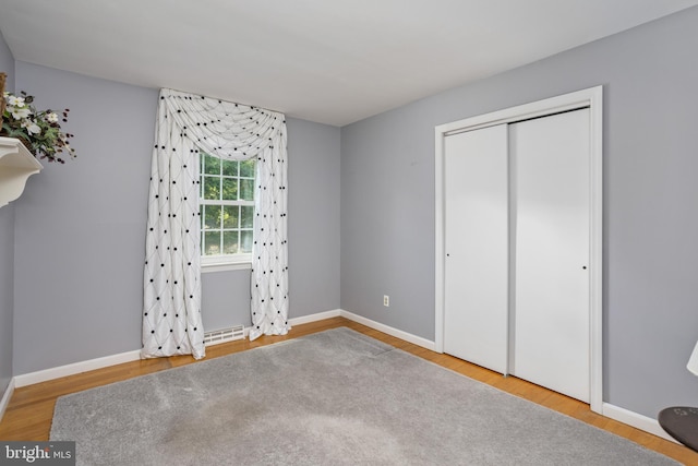 3847 Quakerbridge Rd, Hamilton, NJ 08619 - unfurnished bedroom featuring wood finished floors and a closet