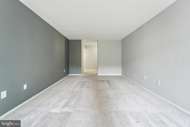 9810 Kingsbridge Dr Unit 102, Fairfax, VA 22031 - carpeted spare room featuring baseboards