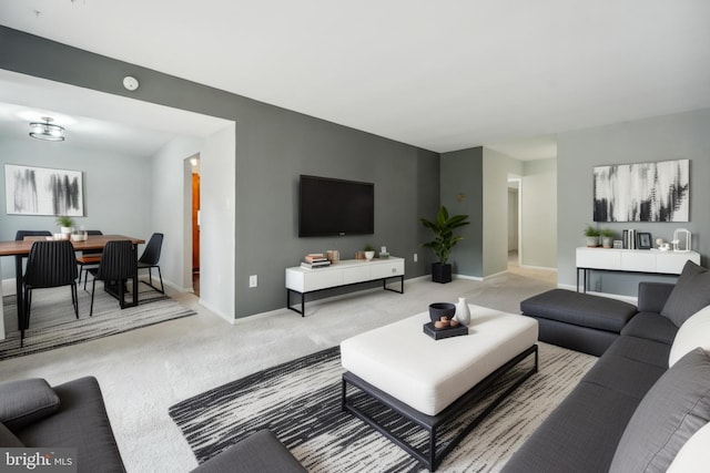 9810 Kingsbridge Dr Unit 102, Fairfax, VA 22031 - living area with carpet and baseboards