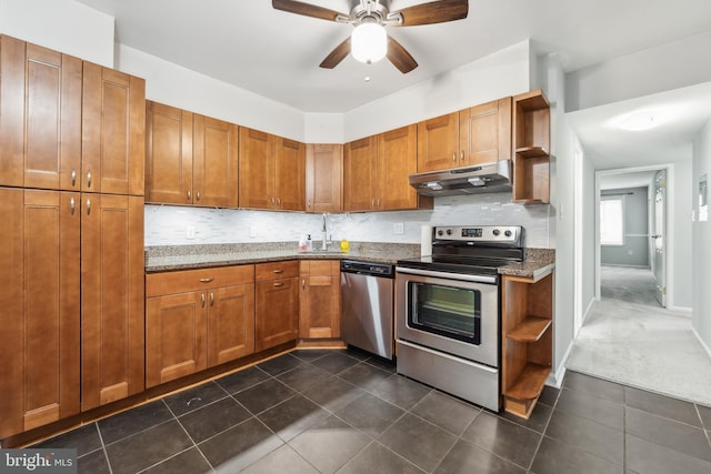 9810 Kingsbridge Dr Unit 102, Fairfax, VA 22031 - kitchen with stainless steel appliances, under cabinet range hood, open shelves, ceiling fan, and decorative backsplash
