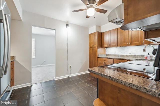 9810 Kingsbridge Dr Unit 102, Fairfax, VA 22031 - kitchen featuring brown cabinetry, freestanding refrigerator, exhaust hood, and a ceiling fan