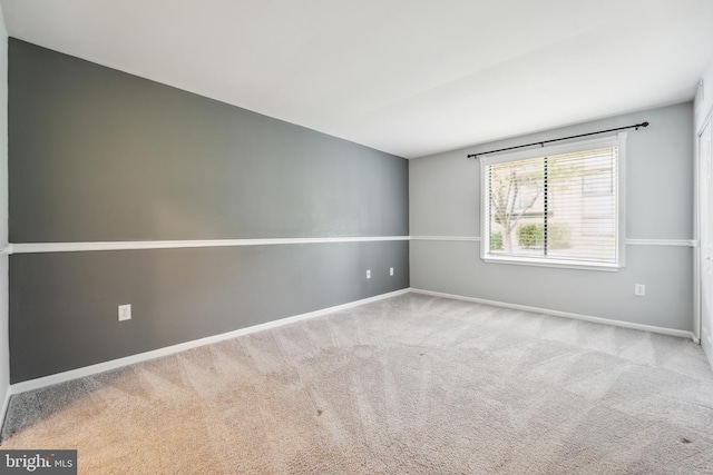 9810 Kingsbridge Dr Unit 102, Fairfax, VA 22031 - carpeted spare room featuring baseboards