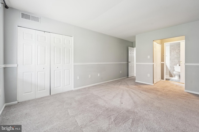 9810 Kingsbridge Dr Unit 102, Fairfax, VA 22031 - unfurnished bedroom with carpet floors, a closet, and connected bathroom