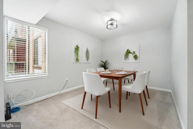 9810 Kingsbridge Dr Unit 102, Fairfax, VA 22031 - dining room with light carpet and healthy amount of natural light