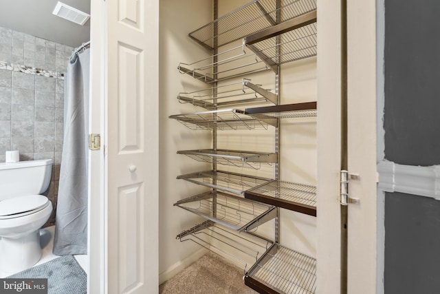 9810 Kingsbridge Dr Unit 102, Fairfax, VA 22031 - bathroom featuring toilet and tile walls