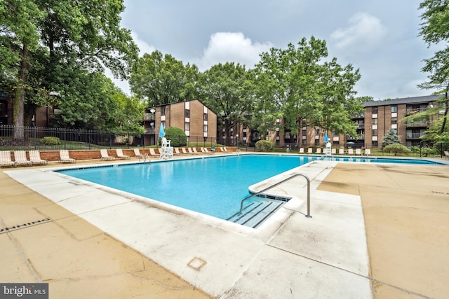 9810 Kingsbridge Dr Unit 102, Fairfax, VA 22031 - community pool with a patio area
