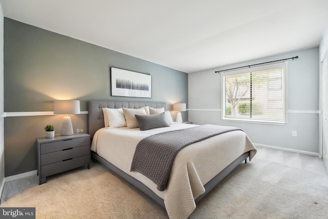 9810 Kingsbridge Dr Unit 102, Fairfax, VA 22031 - bedroom with light colored carpet and baseboards