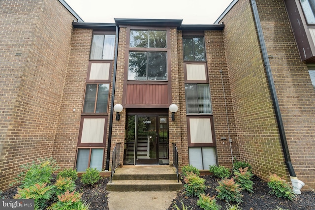9810 Kingsbridge Dr Unit 102, Fairfax, VA 22031 - property entrance featuring brick siding