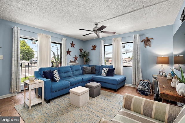 14 136th St Unit 101, Ocean City, MD 21842 - tiled living area with ceiling fan and a textured ceiling