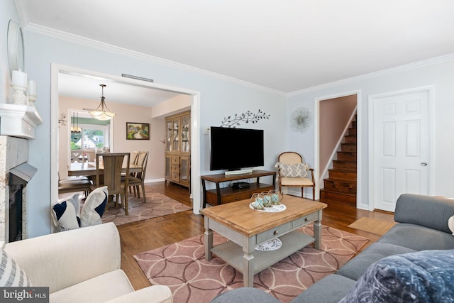478 Alexander Ave, Maple Shade, NJ 08052 - living room with wood finished floors, crown molding, and stairway