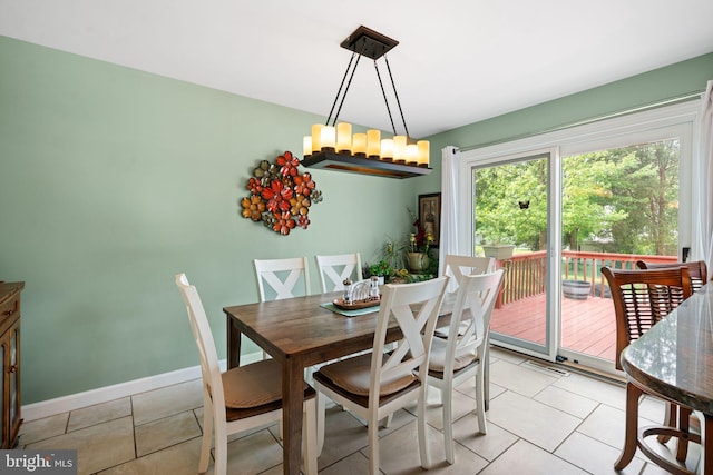 478 Alexander Ave, Maple Shade, NJ 08052 - dining room with a chandelier and light tile patterned flooring