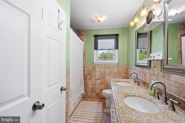 478 Alexander Ave, Maple Shade, NJ 08052 - bathroom featuring tile walls, tile patterned floors, double vanity, and wainscoting
