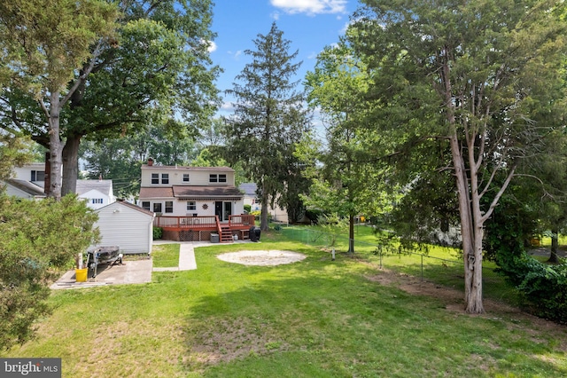 478 Alexander Ave, Maple Shade, NJ 08052 - view of green lawn featuring a deck and a patio area