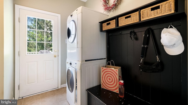 5510 Haverhill Ln, Doylestown, PA 18902 - laundry room with estacked washer and dryer and light tile patterned floors