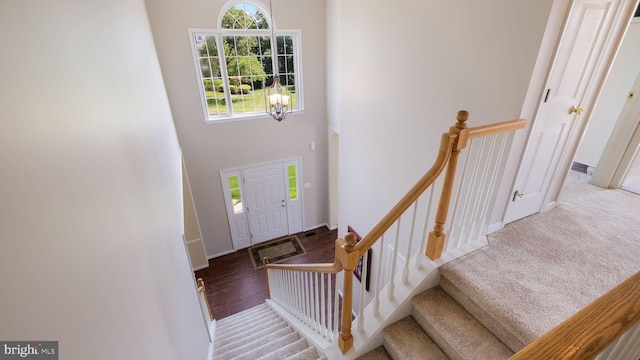 5510 Haverhill Ln, Doylestown, PA 18902 - entryway with a chandelier, a high ceiling, and wood finished floors