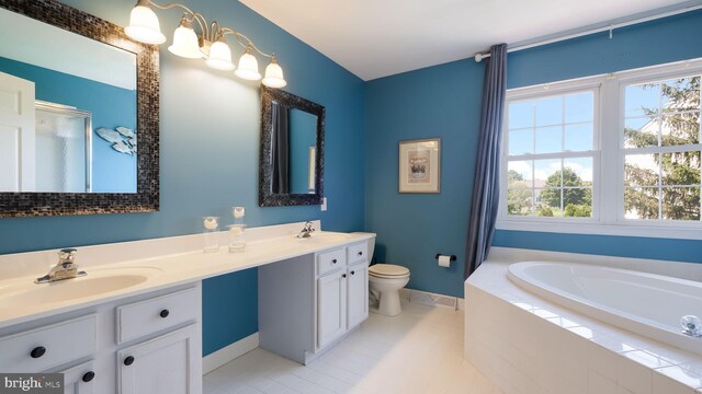5510 Haverhill Ln, Doylestown, PA 18902 - full bathroom featuring a garden tub, double vanity, and tile patterned floors