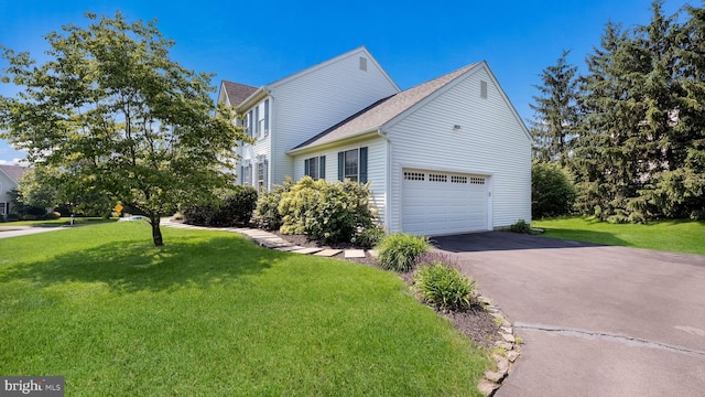 5510 Haverhill Ln, Doylestown, PA 18902 - view of side of property featuring asphalt driveway, a lawn, and an attached garage
