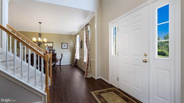 5510 Haverhill Ln, Doylestown, PA 18902 - foyer with a chandelier, dark wood finished floors, and stairway
