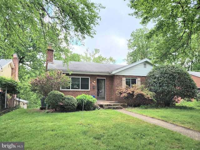 142 Fleetwood Ter, Silver Spring, MD 20910 - ranch-style home featuring brick siding, a front yard, and a chimney