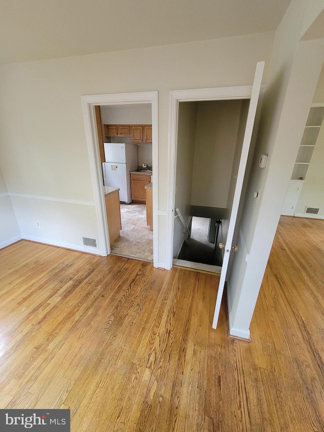 142 Fleetwood Ter, Silver Spring, MD 20910 - unfurnished bedroom with freestanding refrigerator and light wood-type flooring
