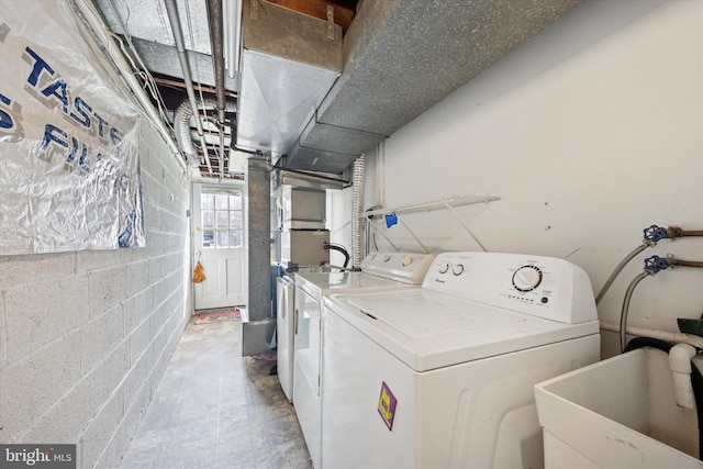 236 Lynn Rd, Ridley Park, PA 19078 - washroom with washing machine and clothes dryer and concrete block wall