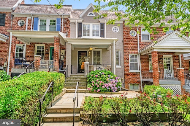 3754 W St NW, Washington, DC 20007 - view of front facade with a porch, brick siding, and a ceiling fan