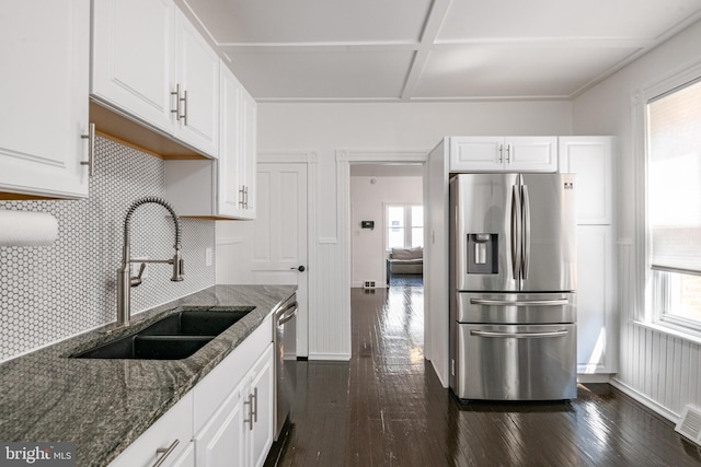 16 S 2nd St, Womelsdorf, PA 19567 - kitchen with stainless steel appliances, plenty of natural light, dark wood finished floors, and white cabinets