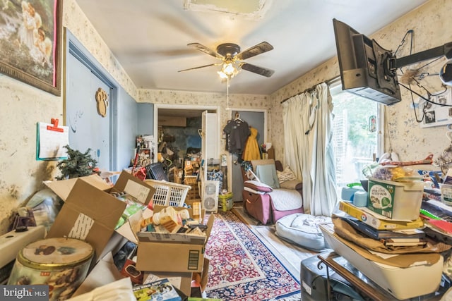 2178 Judith Rd, Hartly, DE 19953 - living area with wallpapered walls and a ceiling fan