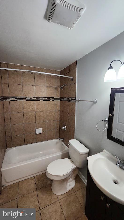 1756 Forest Park Dr, District Heights, MD 20747 - bathroom with vanity, shower / washtub combination, and tile patterned floors