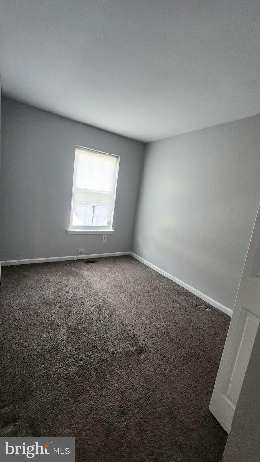 1756 Forest Park Dr, District Heights, MD 20747 - unfurnished room with carpet floors and baseboards